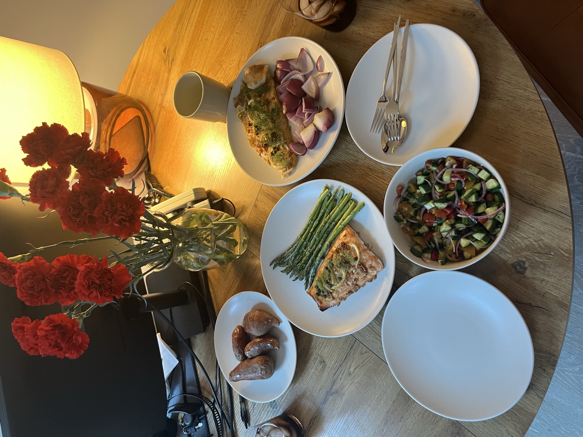 Overhead view of the full dinner table setting with all dishes
